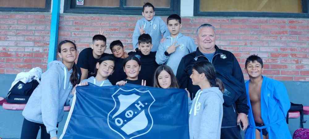 &Sigma;&upsilon;&mu;&mu;&epsilon;&tau;&omicron;&chi;έ&sigmaf; &kappa;&alpha;&iota; &epsilon;&pi;&iota;&delta;ό&sigma;&epsilon;&iota;&sigmaf; &tau;&omega;&nu; &kappa;&omicron;&lambda;&upsilon;&mu;&beta;&eta;&tau;ώ&nu; &tau;&omicron;&upsilon; &Omicron;&Phi;&Eta;