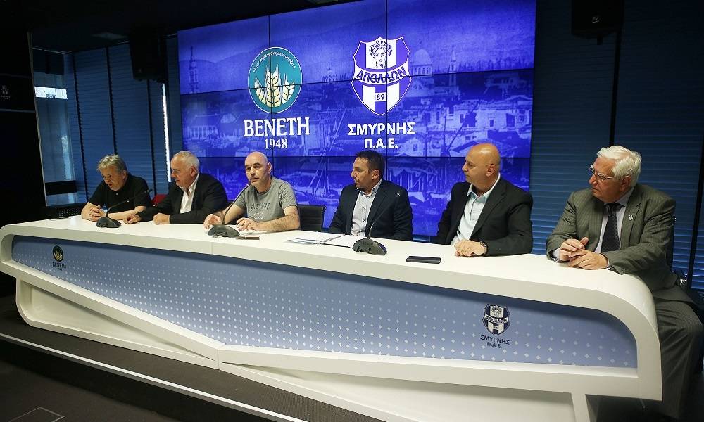 &Tau;&omicron; "&delta;ώ&rho;&omicron; &Theta;&epsilon;&omicron;ύ &alpha;&pi;&omicron; &tau;&omicron;&nu; &Omicron;&Phi;&Eta;" &kappa;&alpha;&iota; &tau;&alpha; &delta;&iota;&alpha;&kappa;ό&sigma;&iota;&alpha; &tau;&omicron; &chi;&rho;ό&nu;&omicron;, &tau;&omicron;&upsilon; &Pi;&alpha;&pi;&alpha;&delta;ό&pi;&omicron;&upsilon;&lambda;&omicron;&upsilon;, &sigma;&tau;&omicron;&nu; &Alpha;&pi;ό&lambda;&lambda;&omega;&nu;&alpha;